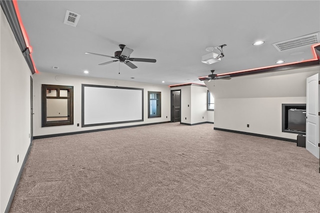 cinema featuring carpet, visible vents, and recessed lighting