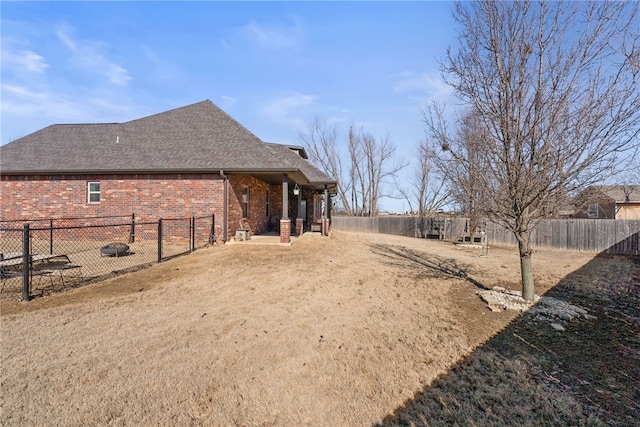 view of yard with a fenced backyard