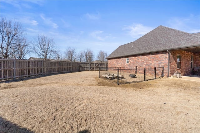 view of yard featuring a fenced backyard