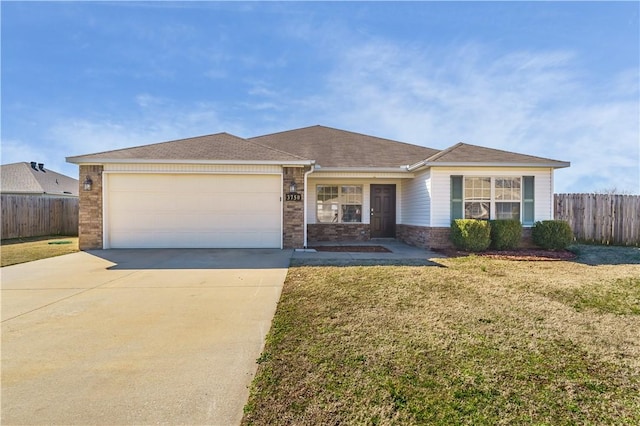 ranch-style house with brick siding, concrete driveway, a front yard, fence, and a garage