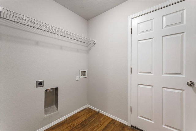 laundry room featuring dark wood-style floors, hookup for a washing machine, electric dryer hookup, laundry area, and baseboards