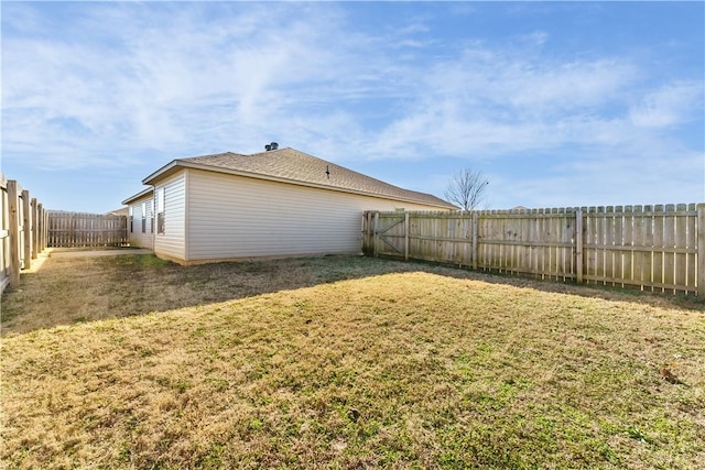 view of yard featuring a fenced backyard