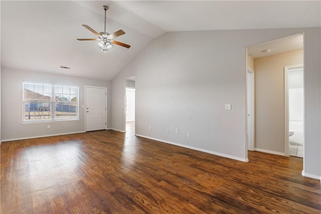 unfurnished living room featuring dark wood-style floors, lofted ceiling, visible vents, ceiling fan, and baseboards