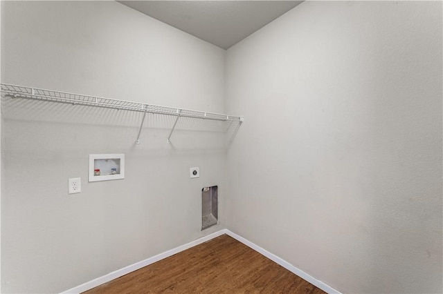 laundry room with laundry area, baseboards, dark wood-style floors, hookup for a washing machine, and hookup for an electric dryer