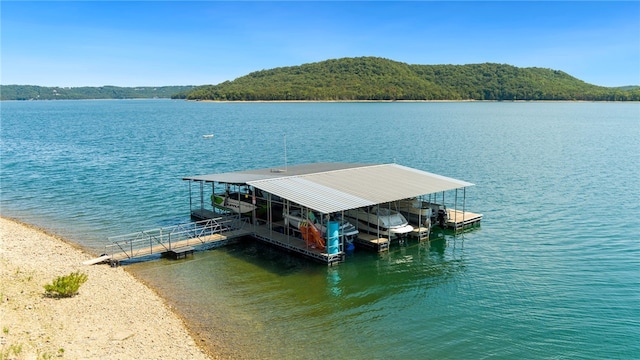 view of dock with a water view