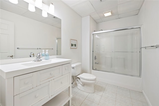 full bathroom with visible vents, toilet, enclosed tub / shower combo, tile patterned flooring, and vanity