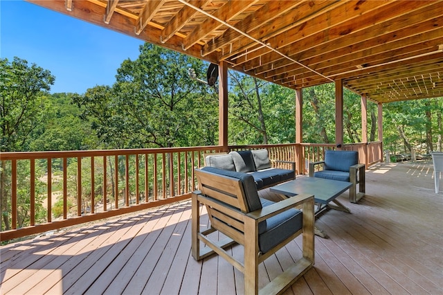 wooden deck featuring outdoor lounge area