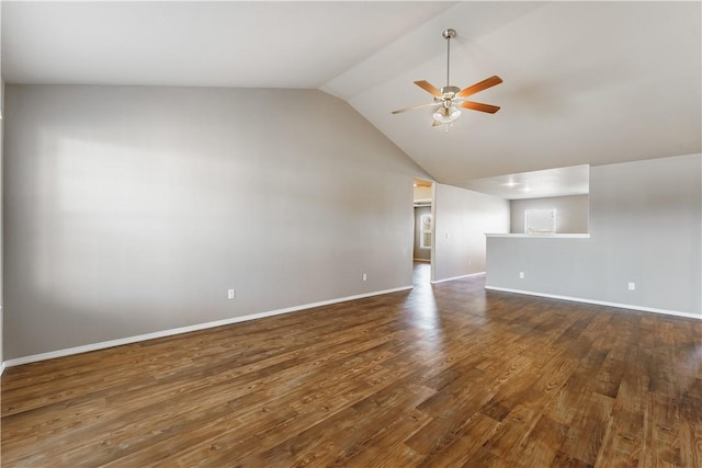 unfurnished living room featuring ceiling fan, high vaulted ceiling, dark wood finished floors, and baseboards