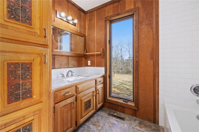 full bathroom with tile patterned flooring, visible vents, plenty of natural light, and vanity