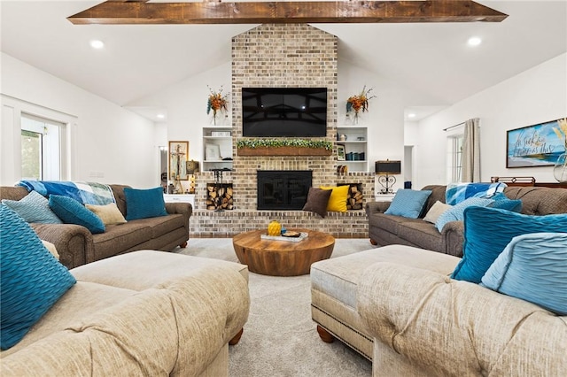 carpeted living room with a brick fireplace, high vaulted ceiling, beam ceiling, and recessed lighting