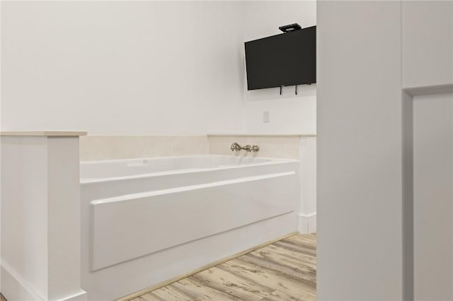 3205 Mc 4021, Everton, AR 72633 - full bathroom with a garden tub and wood finished floors