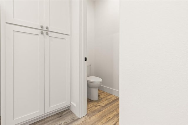 3205 Mc 4021, Everton, AR 72633 - bathroom with toilet and wood finished floors