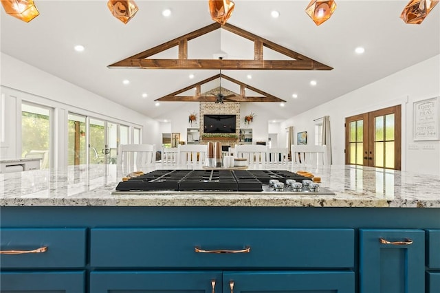 3205 Mc 4021, Everton, AR 72633 - kitchen featuring stainless steel gas stovetop, french doors, blue cabinetry, open floor plan, and healthy amount of natural light