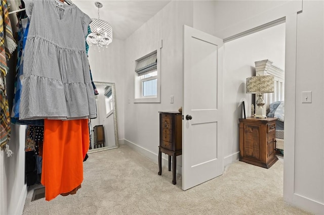 3205 Mc 4021, Everton, AR 72633 - carpeted bedroom featuring baseboards and a chandelier