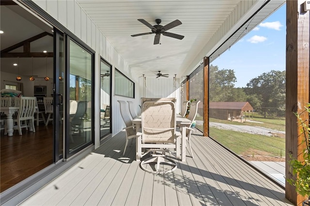 3205 Mc 4021, Everton, AR 72633 - wooden terrace with a ceiling fan, outdoor dining area, and a yard