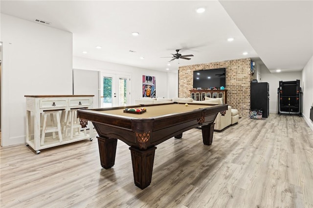 rec room featuring pool table, french doors, recessed lighting, and light wood-style floors