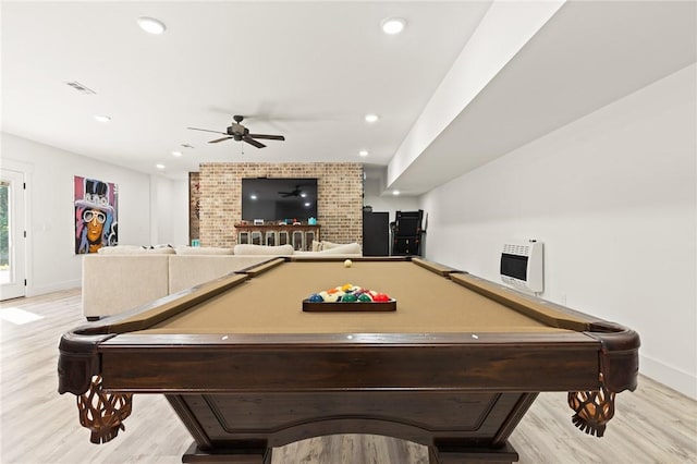 game room featuring visible vents, ceiling fan, heating unit, light wood-type flooring, and recessed lighting