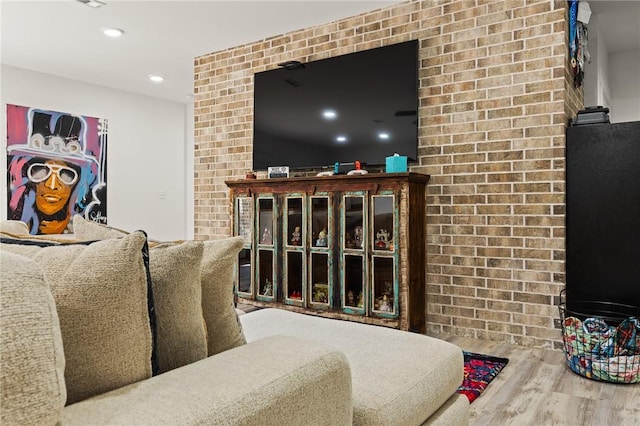 living room featuring wood finished floors and recessed lighting