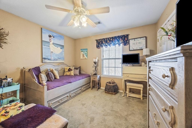 bedroom featuring ceiling fan, carpet, and visible vents