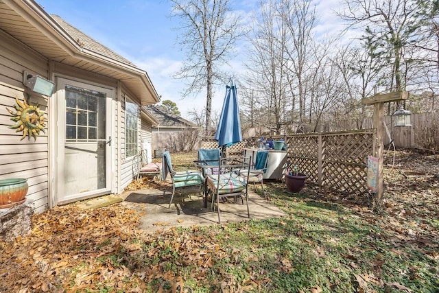 view of yard with a patio area and fence