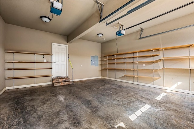 garage with electric panel, baseboards, and a garage door opener