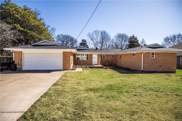 single story home featuring concrete driveway, brick siding, an attached garage, and a front lawn