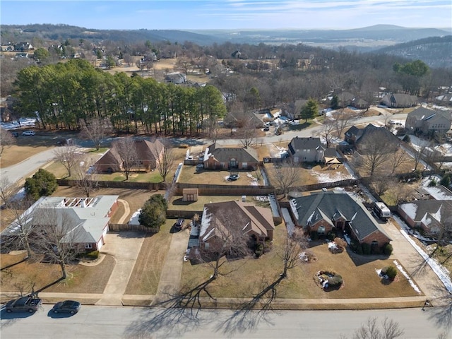 birds eye view of property with a mountain view and a residential view