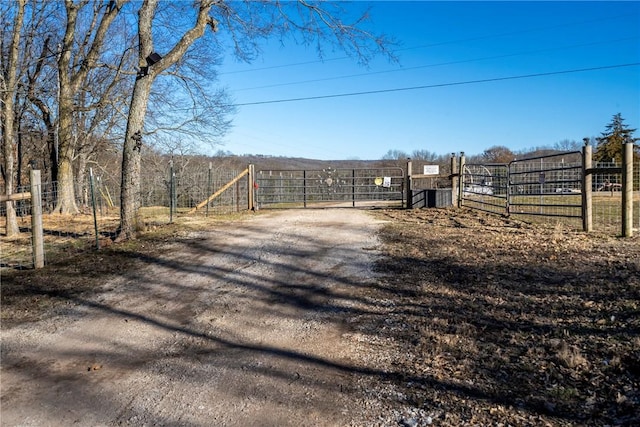 exterior space with a gated entry and a gate