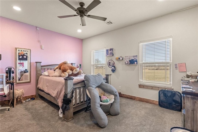 carpeted bedroom featuring baseboards, visible vents, a ceiling fan, and recessed lighting