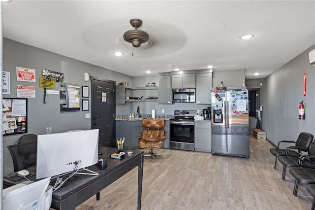 kitchen featuring open shelves, light wood-style flooring, appliances with stainless steel finishes, ceiling fan, and a sink