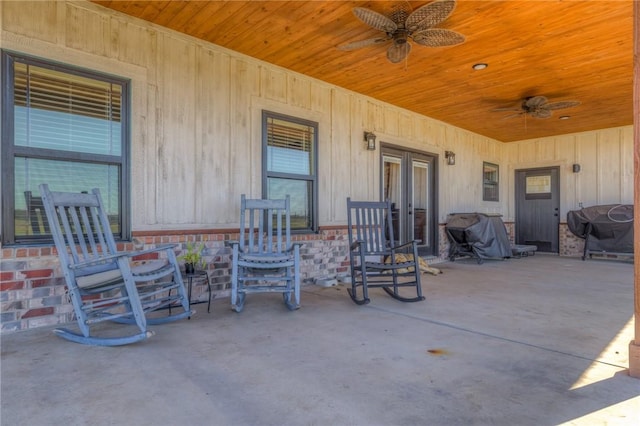 view of patio featuring grilling area, a ceiling fan, and french doors