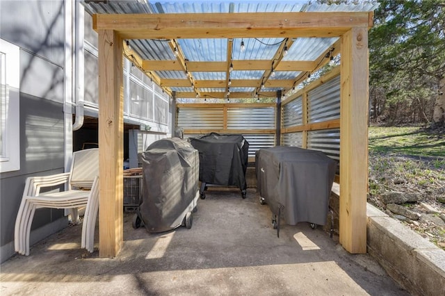 view of patio with a grill