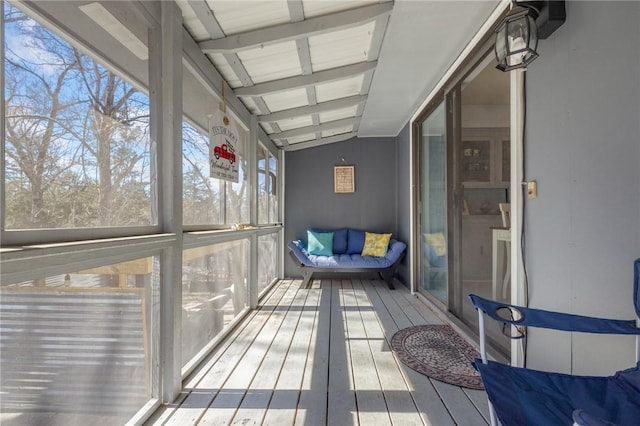 sunroom with lofted ceiling