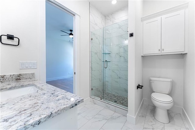 full bath featuring marble finish floor, baseboards, toilet, and a marble finish shower