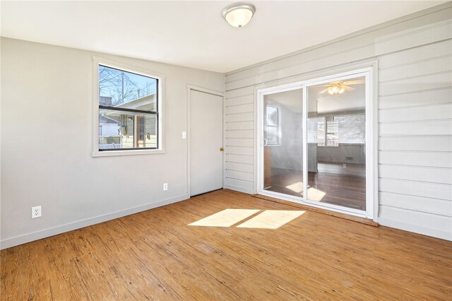 15 White St, Eureka Springs, AR 72632 - unfurnished room with baseboards and wood finished floors