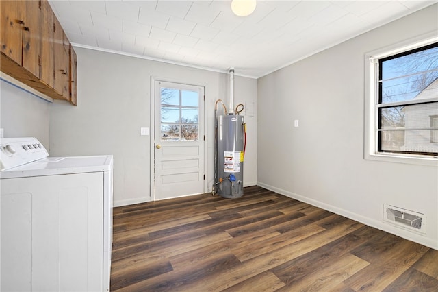 15 White St, Eureka Springs, AR 72632 - clothes washing area featuring washer / dryer, plenty of natural light, visible vents, and cabinet space