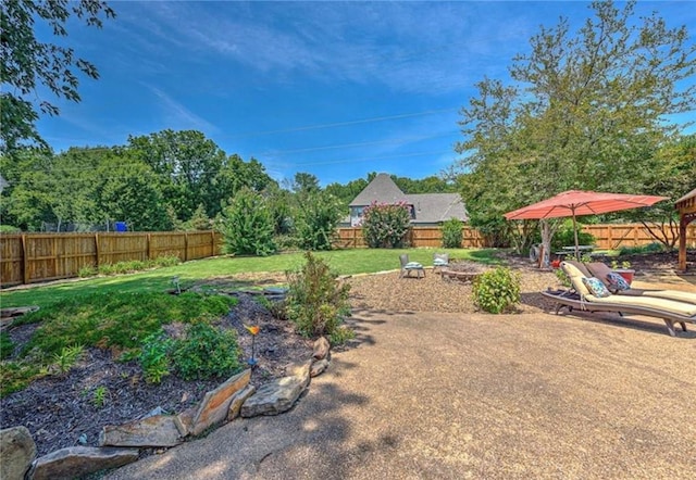 view of yard featuring a fenced backyard