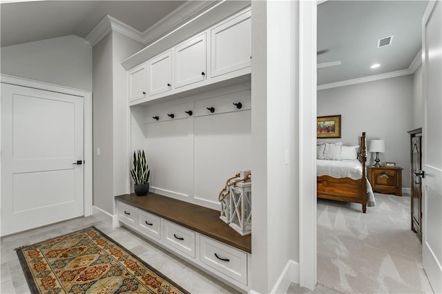 mudroom with ornamental molding, baseboards, and recessed lighting