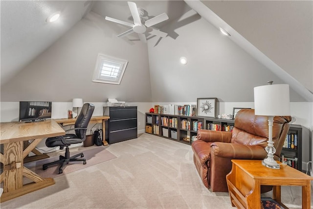 office space featuring vaulted ceiling, carpet floors, and ceiling fan