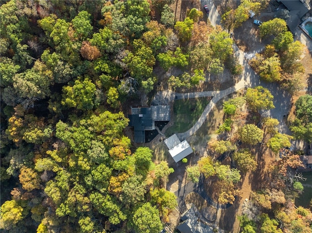 aerial view featuring a view of trees