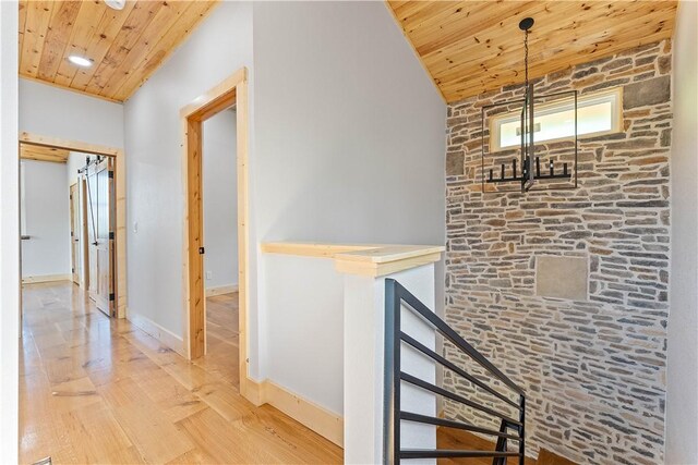16103 E Ar 12th Hwy, Rogers, AR 72756 - corridor featuring wooden ceiling, wood finished floors, an upstairs landing, baseboards, and lofted ceiling