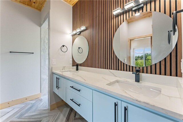 16103 E Ar 12th Hwy, Rogers, AR 72756 - bathroom featuring double vanity and baseboards