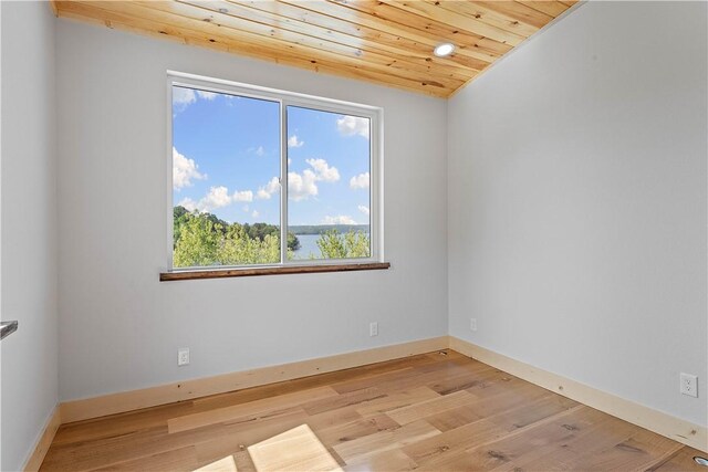 16103 E Ar 12th Hwy, Rogers, AR 72756 - spare room featuring wooden ceiling, plenty of natural light, light wood finished floors, and baseboards