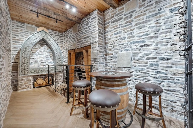 16103 E Ar 12th Hwy, Rogers, AR 72756 - wine room featuring wooden ceiling with exposed beams