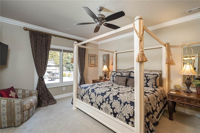 bedroom featuring carpet floors, visible vents, ornamental molding, ceiling fan, and baseboards