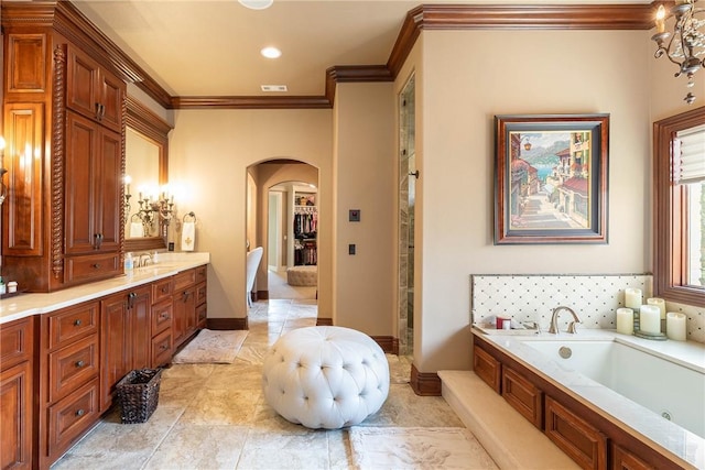 full bathroom with crown molding, baseboards, a bath, and vanity