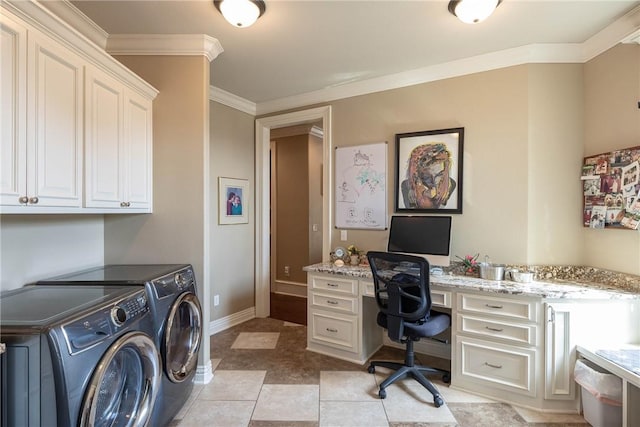 office area featuring light tile patterned floors, baseboards, crown molding, washing machine and dryer, and built in desk