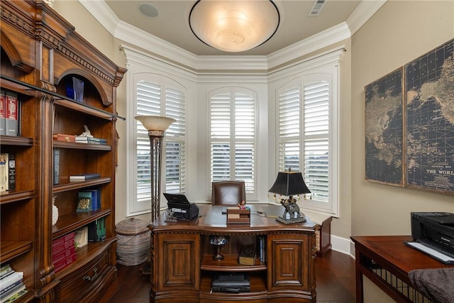 office area with ornamental molding, dark wood finished floors, visible vents, and baseboards