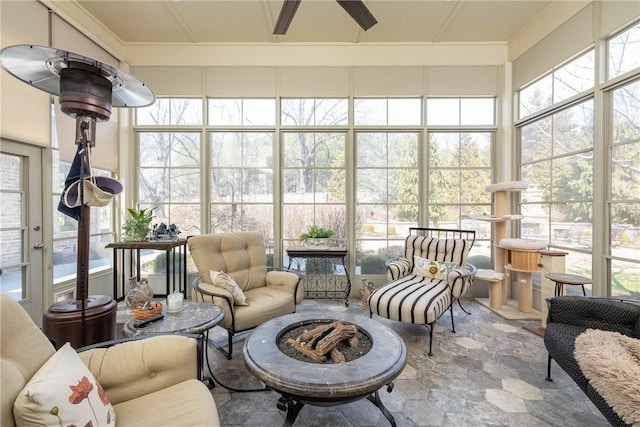 sunroom with a ceiling fan