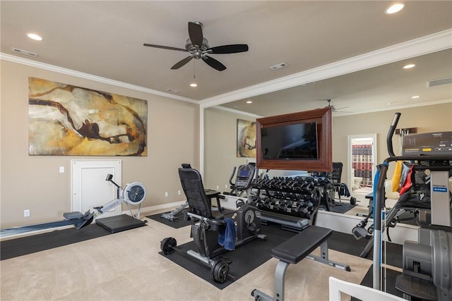 exercise room featuring visible vents and crown molding